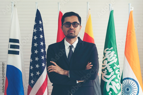 Asian businessman standing ...