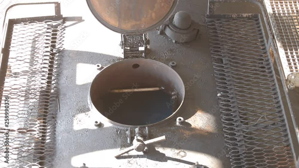 Sampling of railway tanks. Sampling liquid fuel. The observation deck ...