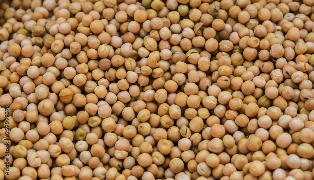 matar or raw pea, uncooked pulses, grains and seeds on white wood. matar or raw pea, uncooked pulses, grains and seeds on white wood.