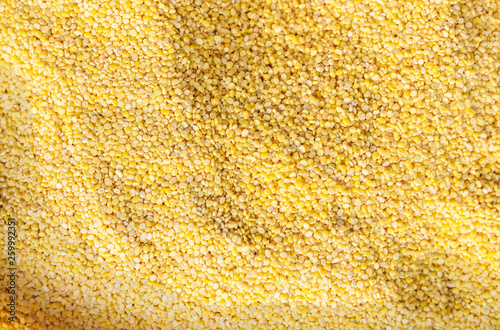 Macro closeup background texture of yellow chana split peas