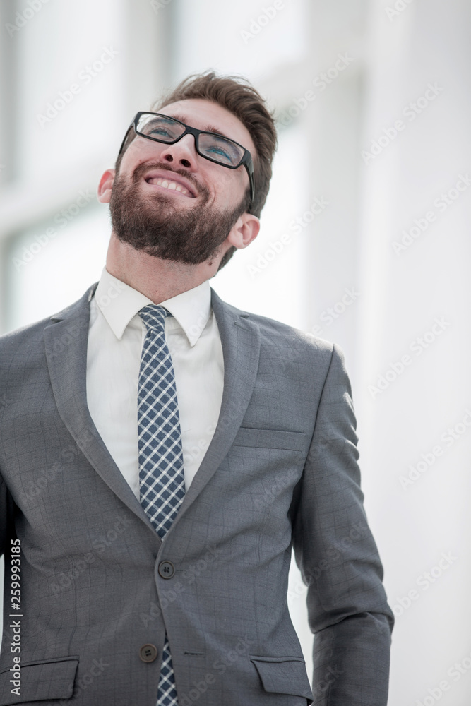 close up.pensive businessman looking up at copy space close up.pensive businessman looking up at copy space