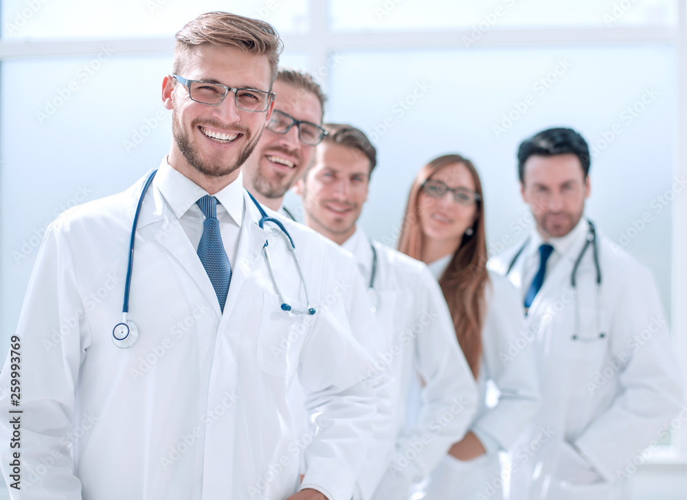 team of doctors standing in the hospital corridor team of doctors standing in the hospital corridor
