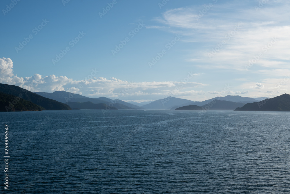 Marlborough Sounds in New Zealand on a clear sunny day - view from the ferry crossing between Wellington and Picton