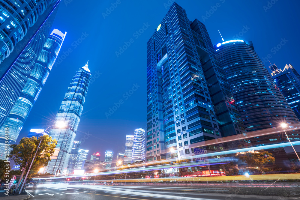 Urban Nightscape Architecture Street and Fuzzy Car Lights..