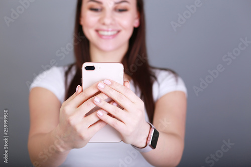 girl is watching her phone