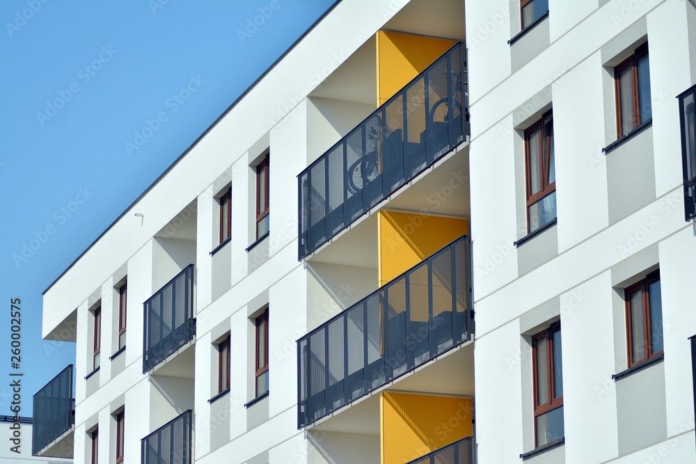 Modern european complex of apartment buildings. Fragment of a modern residential apartment building Modern european complex of apartment buildings. Fragment of a modern residential apartment building