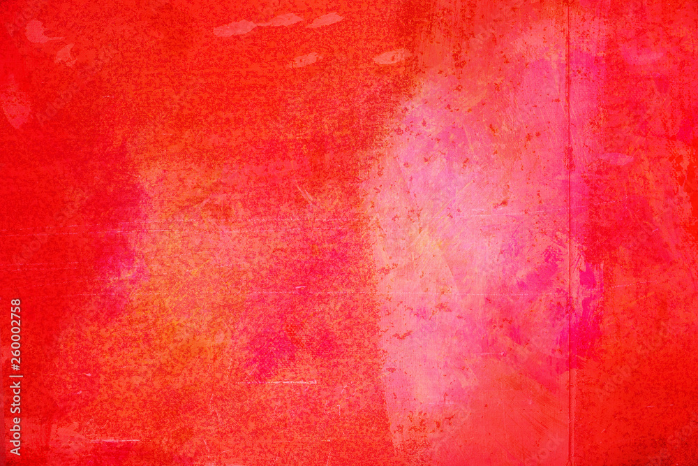 The abstract bright red surface has a brush painted on the background for graphic design. 