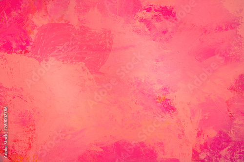 The abstract bright red surface has a brush painted on the background for graphic design. 