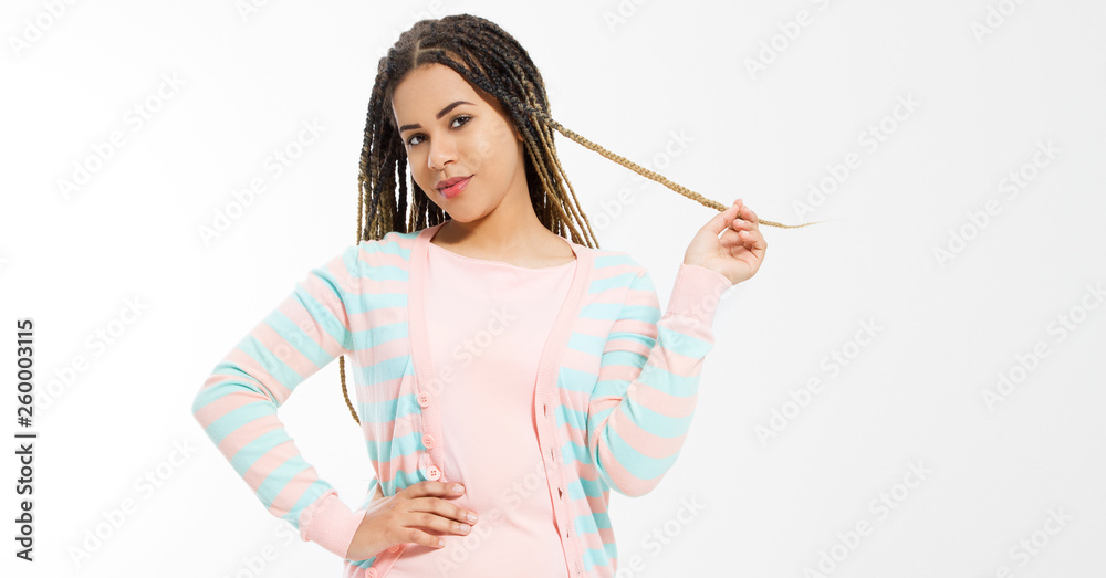 African american girl in fashion clothes isolated on white background. Woman hipster with afro hair style. Copy space. Banner African american girl in fashion clothes isolated on white background. Woman hipster with afro hair style. Copy space. Banner