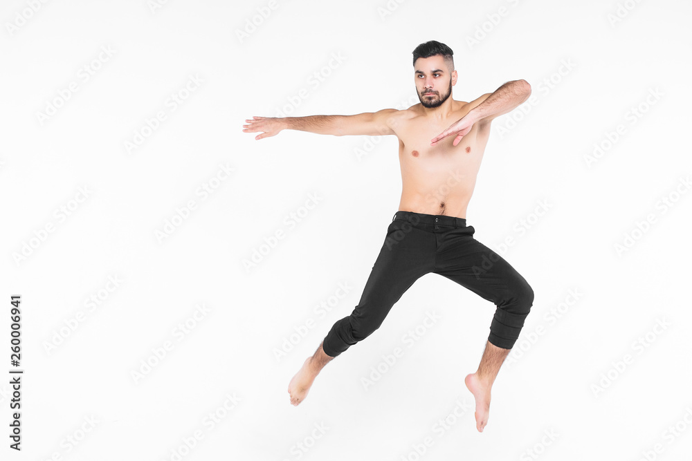 Full length of man  ballet dancer leaping in mid air isolated on white background.
