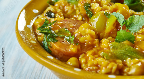 Spinach, sausage and chickpea hotpot