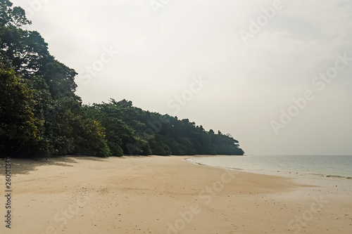 White sand beach on the tropical island on sunny day photo