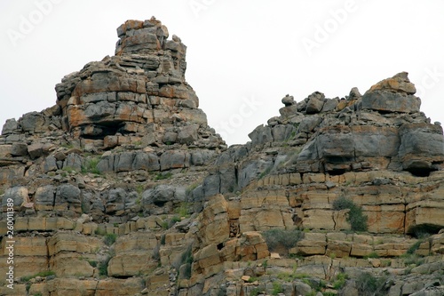 Unique compressed rock layers formation in various colors, Nature and Geological background. © Christophe