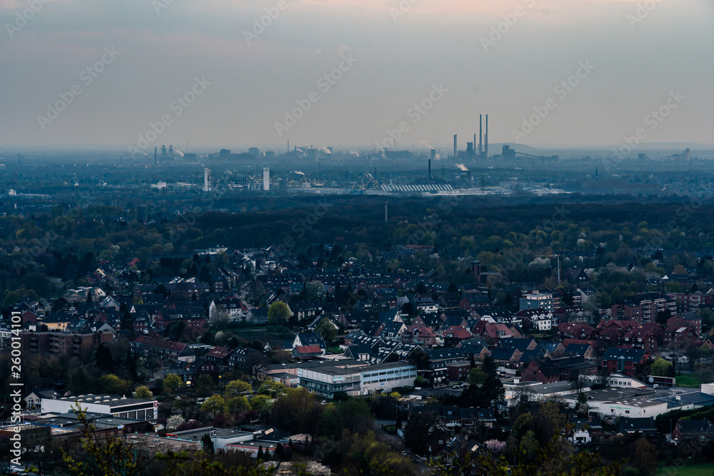 residential urban area of Oberhausen Germany Europe with heavy industry of the Ruhr Area, Ruhrgebiet, in background
