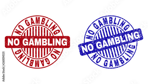 Grunge NO GAMBLING round stamp seals isolated on a white background. Round seals with grunge texture in red and blue colors. Vector rubber overlay of NO GAMBLING text inside circle form with stripes.
