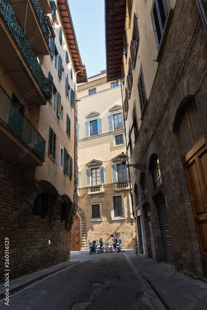 Narrow alley at downtown of Florence in Tuscany, Italy