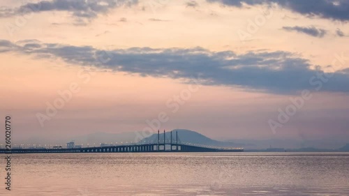 4K Time Lapse view of sunrise from Penang Bridge of George Town photo