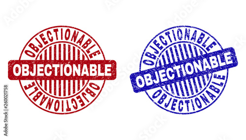 Grunge OBJECTIONABLE round stamp seals isolated on a white background. Round seals with grunge texture in red and blue colors.