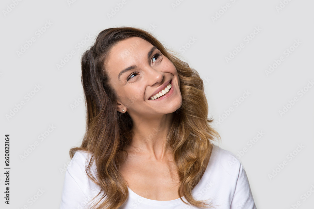 Head shot portrait attractive millennial female over white looking ahead Head shot portrait attractive millennial female over white looking ahead