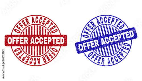 Grunge OFFER ACCEPTED round stamps isolated on a white background. Round seals with grunge texture in red and blue colors.