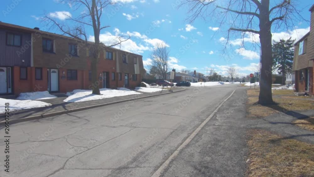 Looking out of a subdivision with townhouses. Looking out of a subdivision with townhouses.