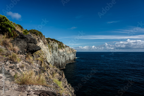 seascape with cliff in terceria, view of the volcano's cliff in terceira. seascape in azores, portugal.