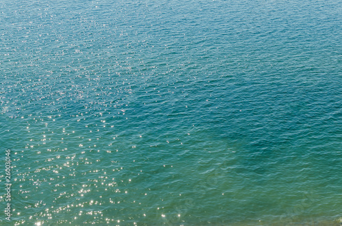 Ripples on the sea surface top view, texture background