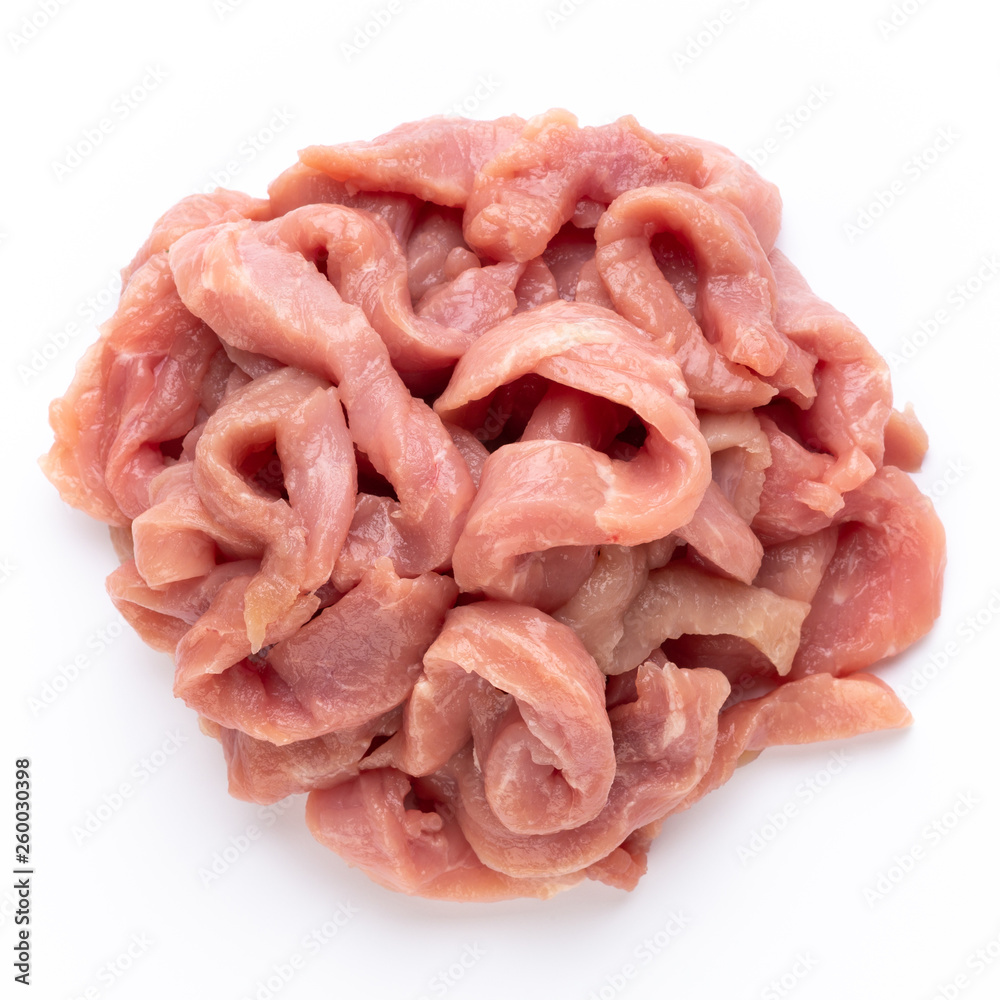 Raw chicken fillet. Small pieces of meat isolated on white. Raw chicken fillet. Small pieces of meat isolated on white.