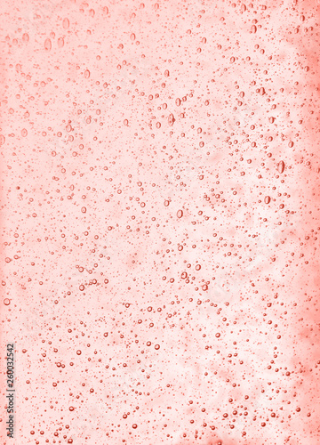 Background texture of transparent pink glass