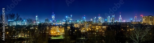 Beautiful  amazing panoramic view of Warsaw  Poland  with skyscrapers and a Palace of Culture and Science during spring flowering at night