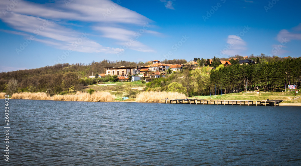 Fototapeta premium Lake and forest in early spring. Sumarice lake by the Kragujevac.