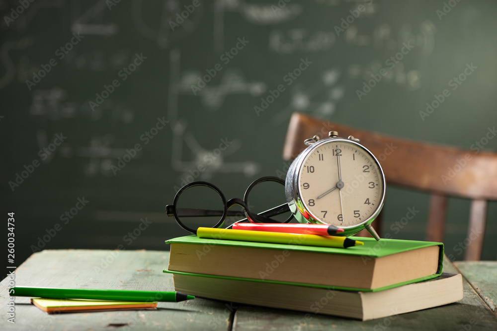 Back to school background with books and alarm clock Stock Photo ...