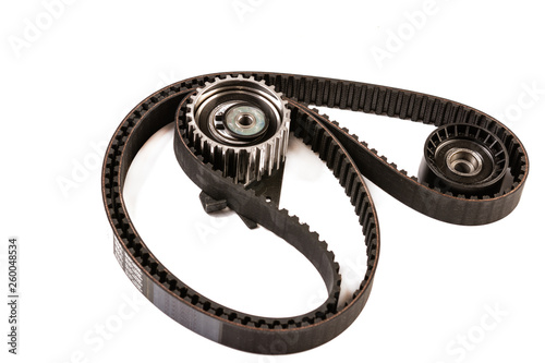 Brand new Timing Belt set isolated above white background.