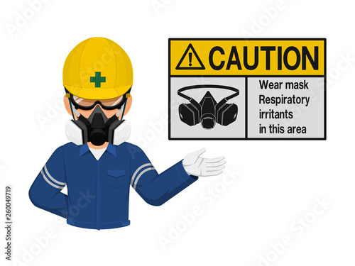 A worker with respiratory mask is presenting respiratory mask warning sign