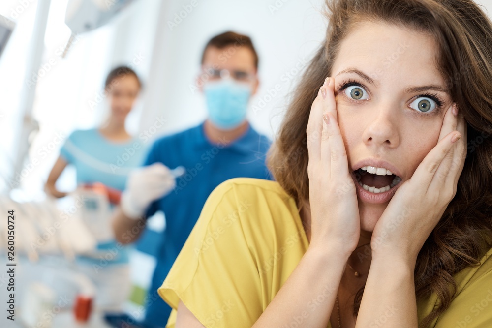 Frightened patient at dentist's surgery Frightened patient at dentist's surgery