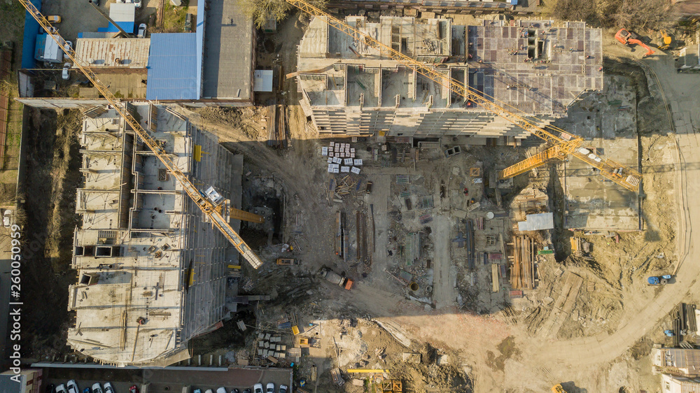 Top down view of construction of modern high-rise buildings.