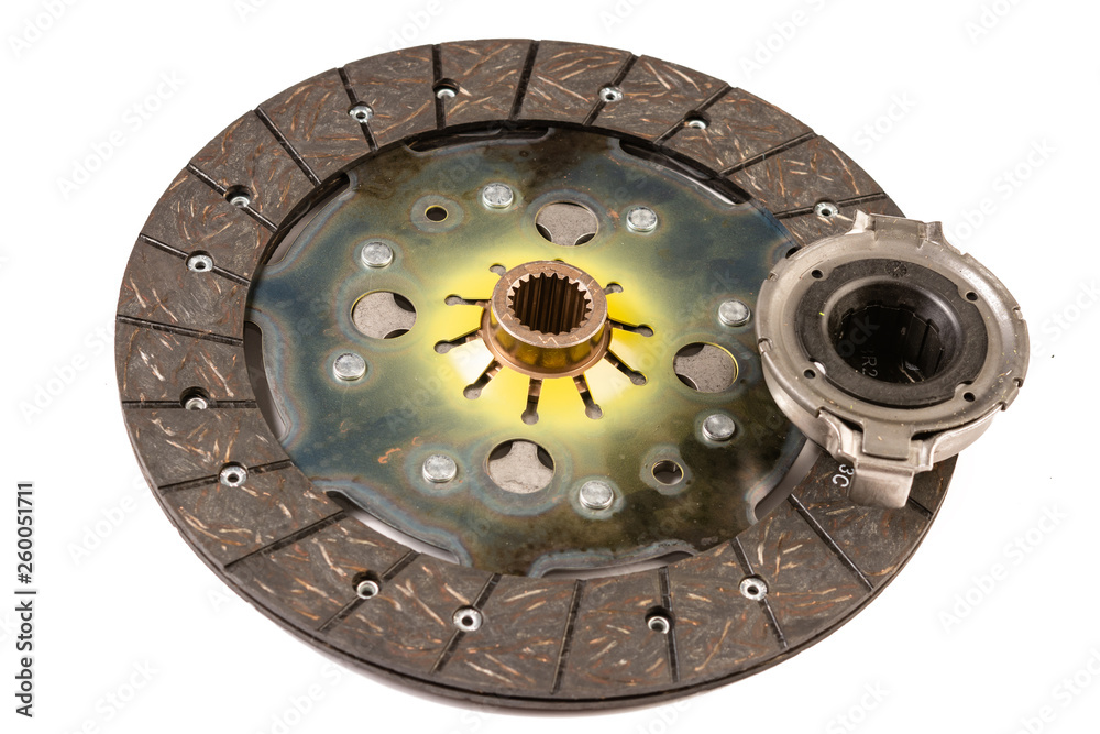 Car clutch isolated above white background. Car concept repairing with spare parts.