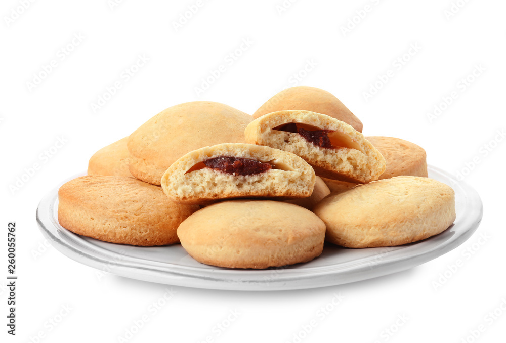 Plate with cookies for Islamic holidays isolated on white. Eid Mubarak Plate with cookies for Islamic holidays isolated on white. Eid Mubarak