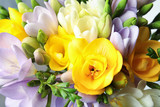 Beautiful bouquet of fresh freesia flowers as background, closeup