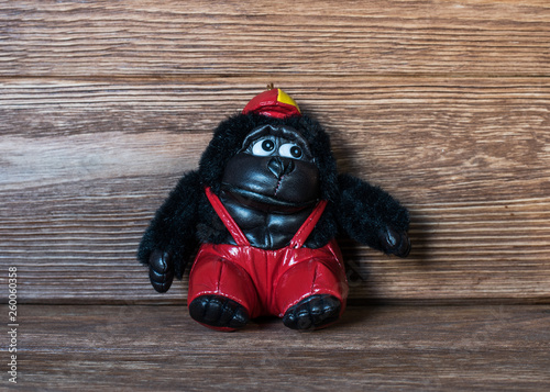 gorilla on the background of a wooden texture photo