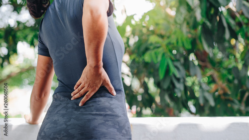 Young Asian women with back pain  , health care concept