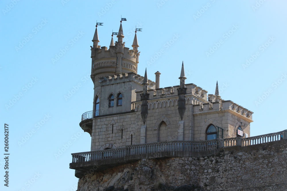 View of The Swallow's Nest. It's s a decorative castle located at Gaspra in Crimea. It was built between 1911 and 1912, on top of the 40-metre (130 ft) high Aurora Cliff, in a Neo-Gothic design.