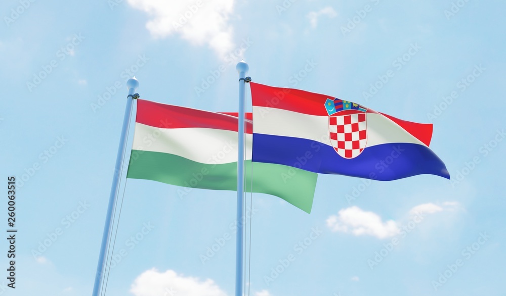Croatia and Hungary, two flags waving against blue sky. 3d image