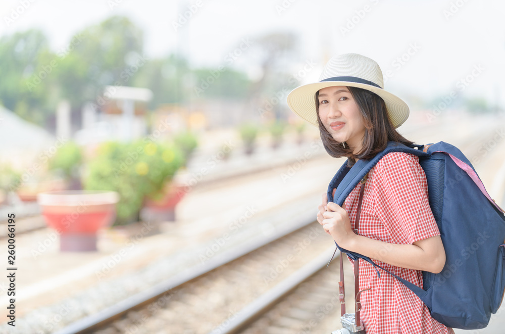 Young Hipster traveler with backpack