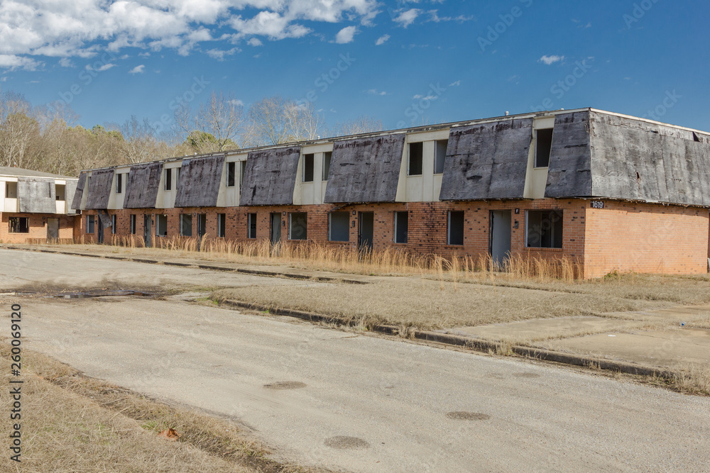 Long row of abandoned project apartments