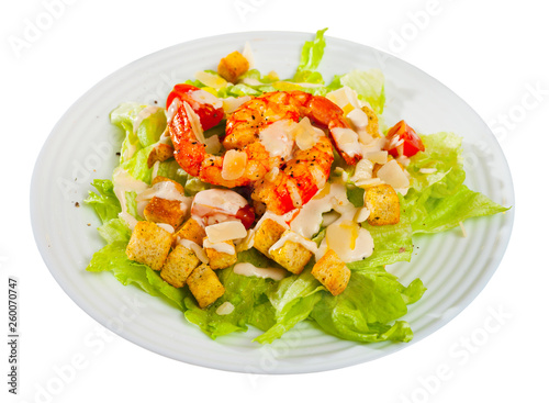 Caesar salad with shrimps, lettuce, sauce and cheese, nobody