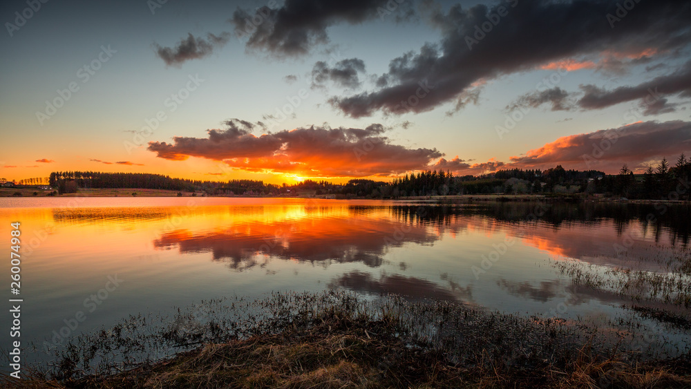 Fototapeta premium Sunset on the Devesset lake near Saint Agrève - Ardèche, France