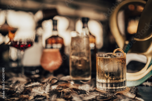 A close up shot of whisky cocktails with ice cubes. Concept of fine alcohol, beverage and cocktails.