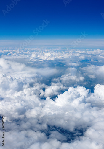 beautiful blanket of clouds from above with blue sky