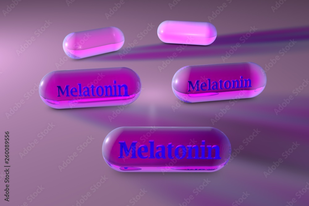 Pink melatonin capsules. Melatonin is a hormone that produces by pineal